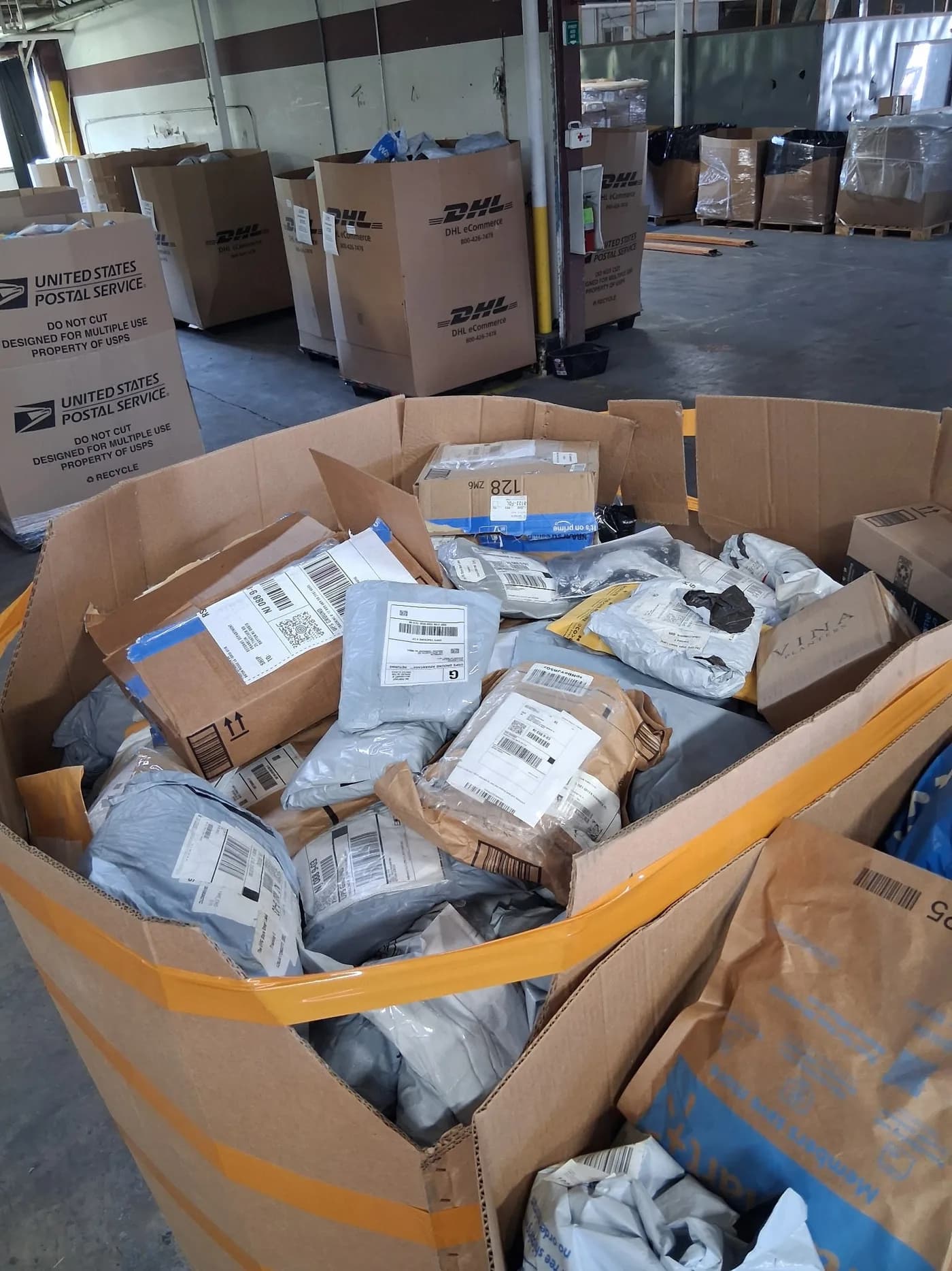 Return Mail Mystery Package Pallet — full lot photo